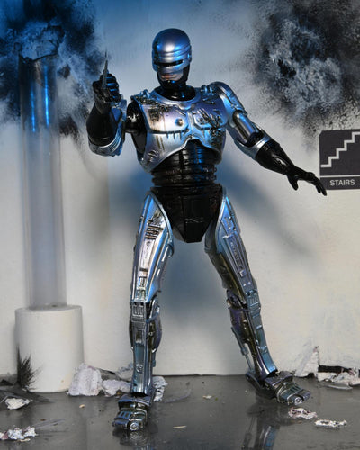 RoboCop - 7" Scale Action Figure - Ultimate Battle Damaged RoboCop with Chair