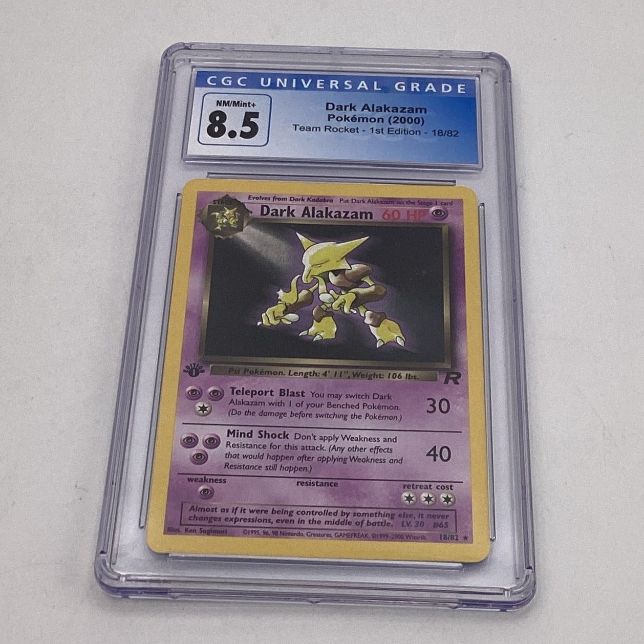 2000 Pokemon Dark Alakazam Team Rocket 1st Edition 18/82 CGC 8.5 Near 2000 Pokemon Dark Alakazam Team Rocket 1st Edition 18/82 CGC 8.5 Near